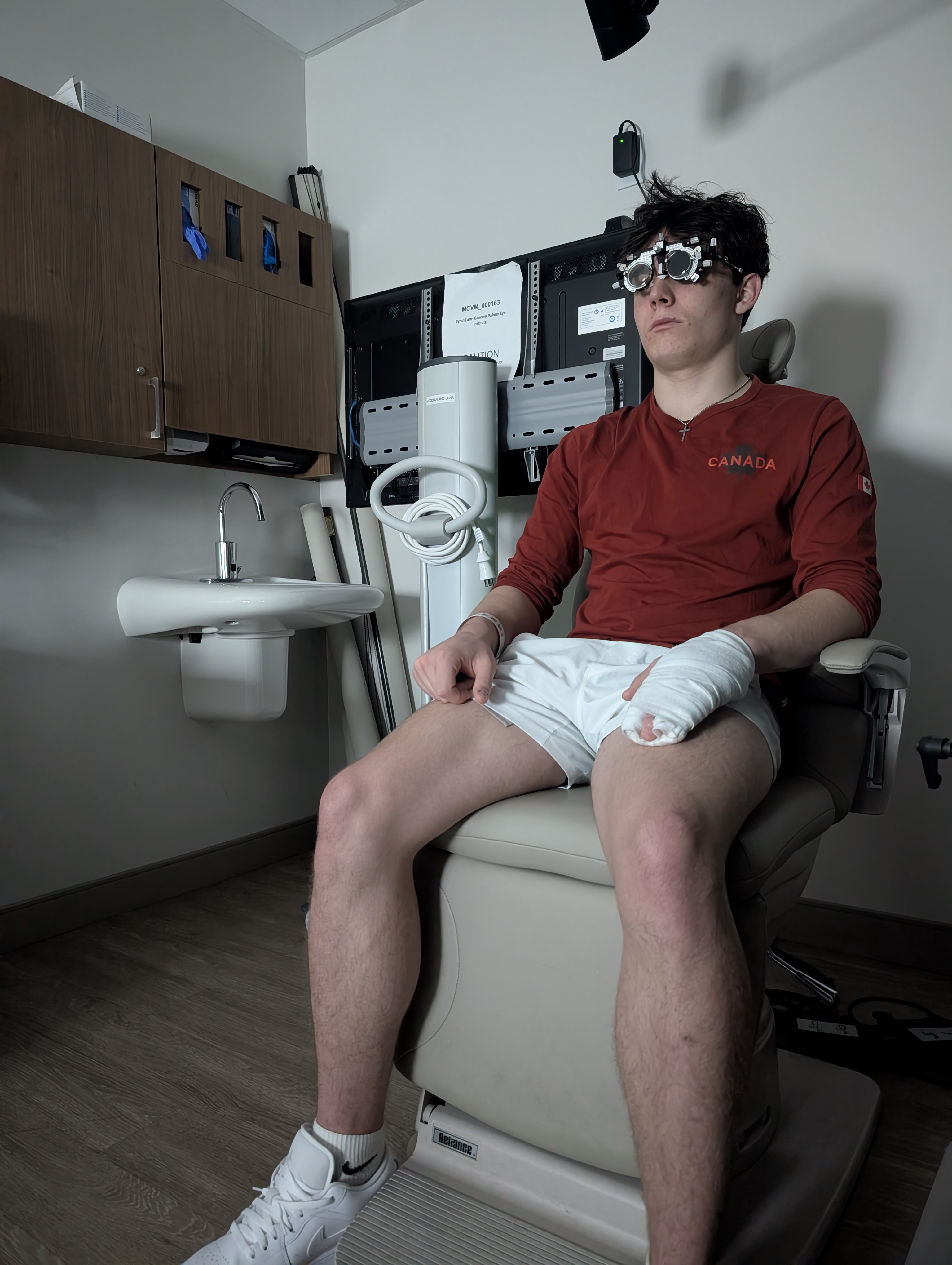Harry Nickerson in Team Canada gear during eye exam
